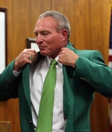 Marshall coach Doc Holliday tries on the green jacket