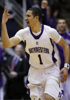 Crawford throws up the NU gang sign.