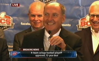 Jim Delany smiles for the first time ever after announcing a four team playoff