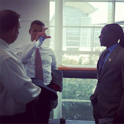 Urban, showing Pelini and Denard the serving size of ribs he was able to wrestle away from Brady Hoke. 