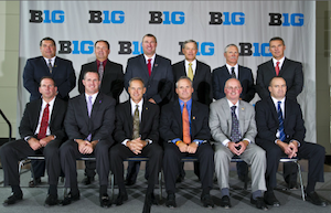 I'm 99.9% sure that Brady Hoke is trying to suck in his gut in this picture.