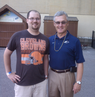 Jim Tressel wearing beads. You can die happy now.