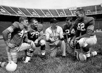  From left to right: Hubert Bobo, Bill Michael, Coach Woody Hayes, Frank Ellwood and Jim Parker