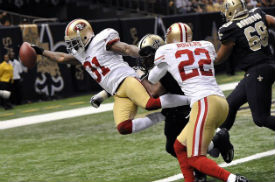 Donte Whitner scored one of two TDs for the Niners defense.