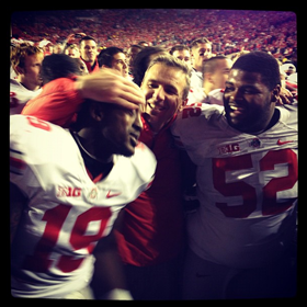Orhian Johnson, Urban Meyer and Johnathan Hankins soak it in on the field in Madison