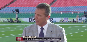 Urban Meyer serves as an ESPN analyst for the BCS Championship Game. Also, his suit is amazing.