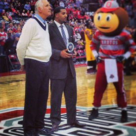 Jim Jackson presents Jerry Lucas with the NCAA Tournament Top 75 Player award Wednesday.