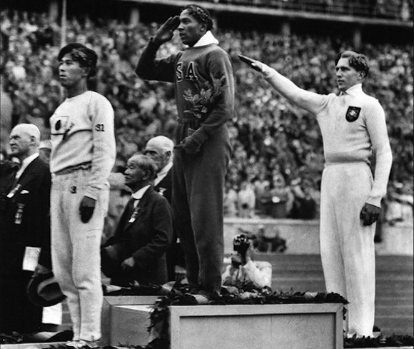 Ohio State's Jesse Owens collects another gold medal at the 1936 Berlin Olympics