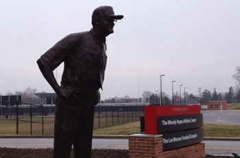 Bronze Woody Hayes can still destroy a yard marker.