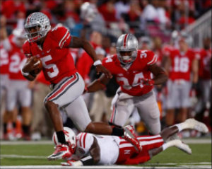 Every picture of Braxton on Google Images has an opponent eating turf.