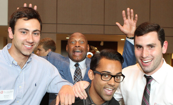 Archie Griffin photobombing students at graduating senior toast night.