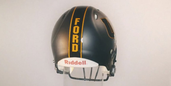 Findlay's new football helmet feature player names on the back.