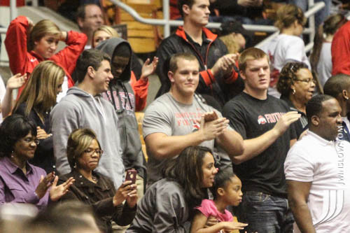 Mike Mitchell, Gareon Conley, Billy Price, and Evan Lisle celebrate a 12-0 season.