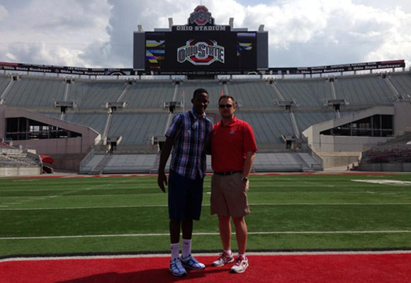 Four-star quarterback Brandon Harris and Ohio State offensive coordinator Tom Herman pose in the Horseshoe