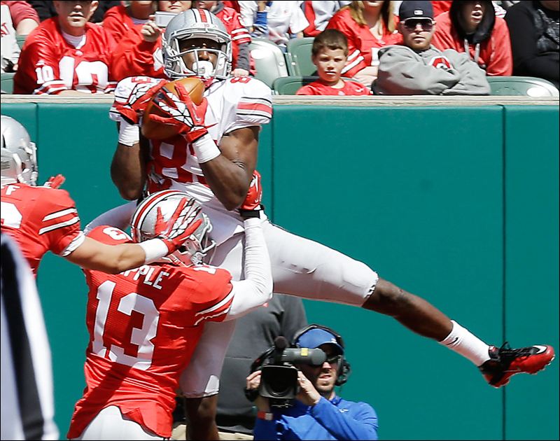 True freshman Eli Apple defends Mike Thomas during Ohio State's spring game