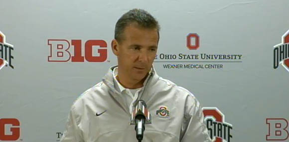 Urban Meyer holds court.