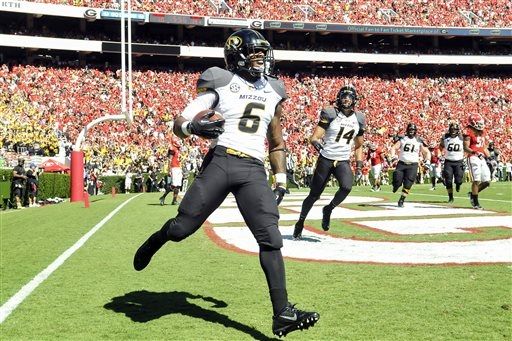 Marcus Murphy celebrates a touchdown run against Georgia