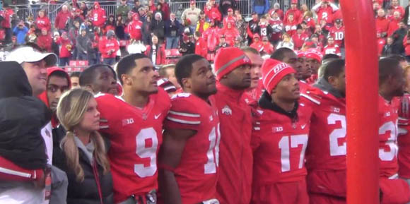 Ohio State football players sing Carmen Ohio following the team's 34-24 win over Iowa