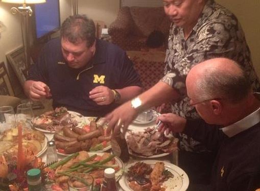 Brady Hoke eating stuff that's probably not healthy and should raise his cholesterol level because he's irreponsible like most Michigan Men.