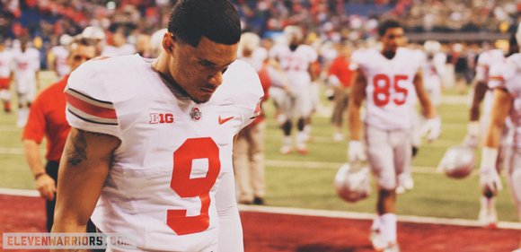 Devin Smithw was one of many Buckeyes to make an uncharacteristic mistake early when he smashed into MSU's punt returner for a 15-yard penalty.
