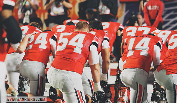 Ohio State players gather before the start of the Orange Bowl.
