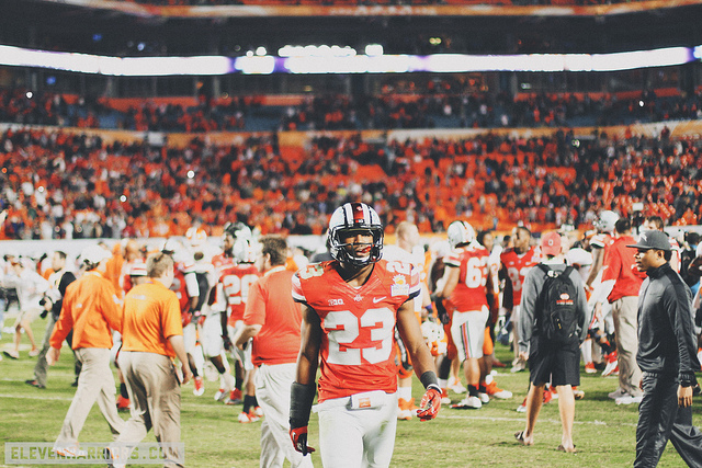 Tyvis Powell walks off the field after the 2014 Orange Bowl
