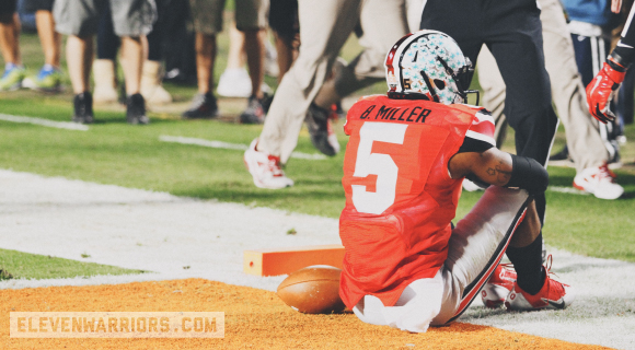 Braxton Miller sits alone in the end zone.