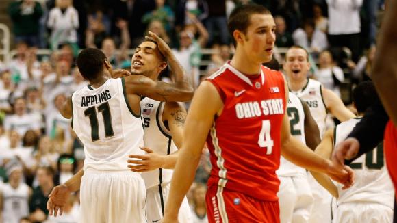 Michigan State players celebrate a win over Ohio State.