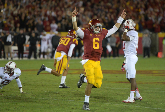 Cody Kessler celebrates against Stanford in 2013.