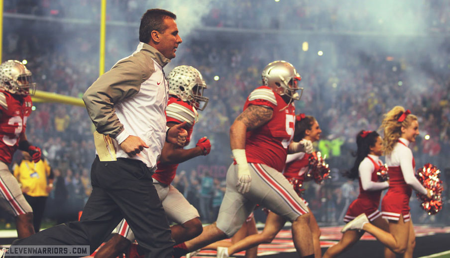 Urban Meyer leads his Buckeyes on to the field at the National Championshipo.