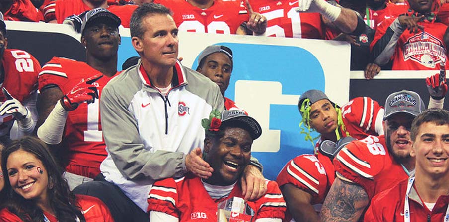 Urban Meyer celebrates with his team at the Big Ten Championship.