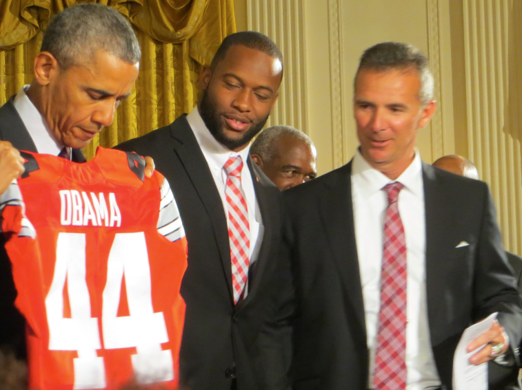 obama, curtis grant and urban meyer