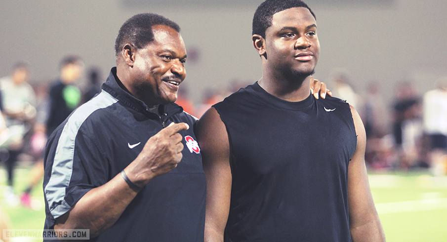 Larry Johnson poses with Donovan Jeter