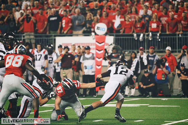 Virginia Tech QB Michael Brewer escapes pressure.