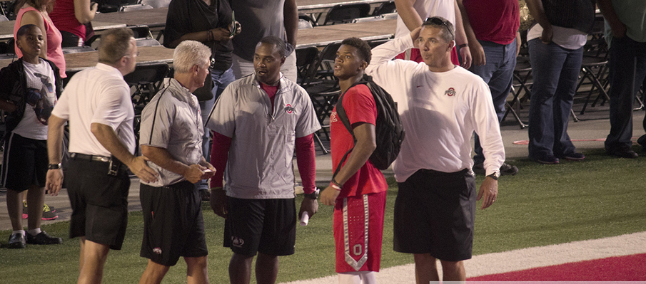 Webb chats with the Ohio State staff at 2013's Friday Night Lights.