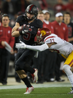 December 5, 2015: Stanford running back Christian McCaffrey (5) holds off USC cornerback Kevon Seymour (13) during the Pac-12 Championship Game between the USC Trojans and the Stanford Cardinal at Levi's Stadium in Santa Clara, CA. (Photo by Matt Cohen/Icon Sportswire)