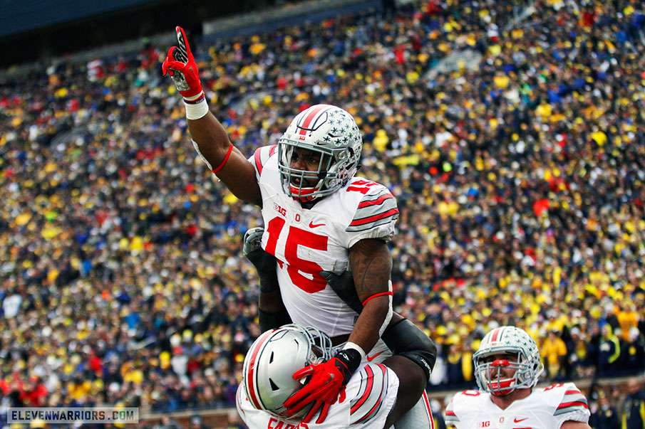 Ezekiel Elliott and Chase Farris celebrate a score in Ann Arbor.