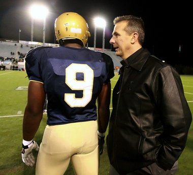 Urban Meyer and Noah Spence.