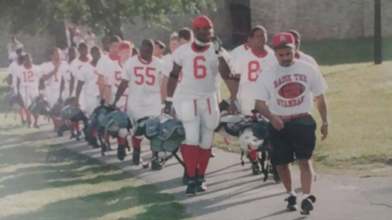 Dru Humphrey walking with his Toledo Rogers teammates