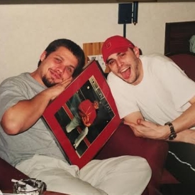 My brother, Woody and me drunkenly celebrate the double-OT defeat of Miami in a dingy hotel room near Hampton, VA.