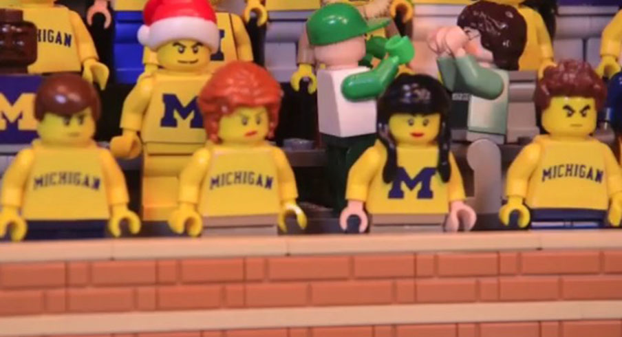 Lego Spartan fans celebrating at Michigan Stadium
