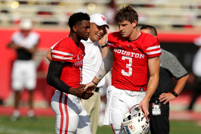 Sep 10, 2016; Houston, TX, USA; Houston Cougars quarterback Kyle Postma (3) shakes hands with Houston Cougars quarterback Greg Ward Jr. (1) prior to the game against the Lamar Cardinals at TDECU Stadium. Mandatory Credit: Erik Williams-USA TODAY Sports