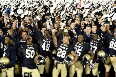 Oct 8, 2016; Annapolis, MD, USA; Navy Midshipmen celebrate on the field after defeating the Houston Cougars 46-40 at Navy Marine Corps Memorial Stadium. Mandatory Credit: Tommy Gilligan-USA TODAY Sports