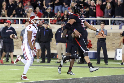 Oct 22, 2016; Lubbock, TX, USA; Texas Tech Red Raiders quarterback Patrick Mahomes (5) scores a touchdown against the Oklahoma Sooners in the second half at Jones AT&T Stadium. Oklahoma defeated Texas Tech 66-59. Mandatory Credit: Michael C. Johnson-USA TODAY Sports