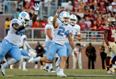 	Oct 1, 2016; Tallahassee, FL, USA; North Carolina Tarheels kicker Nick Weiler (24) celebrates after kicking the game winning field goal against the Florida State Seminoles at Doak Campbell Stadium. Mandatory Credit: Melina Vastola-USA TODAY Sports