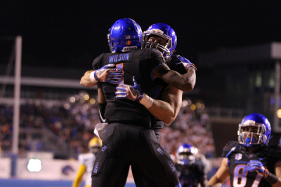 Nov 4, 2016; Boise, ID, USA; Boise State Broncos wide receiver Cedrick Wilson (1) leaps into the arms of Boise State Broncos tight end Jake Knight (84) after scoring a touchdown during second half action against the San Jose State Spartans at Albertsons Stadium. Boise State defeats San Jose State 45-31. Mandatory Credit: Brian Losness-USA TODAY Sports