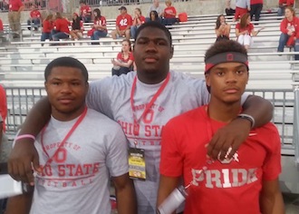 Former Cass Tech and current Ohio State teammates Mike Weber, Josh Alabi and Damon Webb