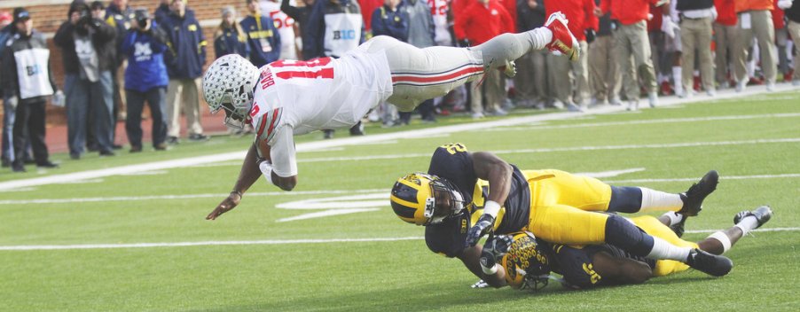 J.T. Barrett tallied 252 total yards and four touchdowns versus Michigan a season ago.