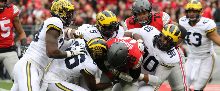 Ohio State's shaky pass protection led to eight Michigan sacks. 