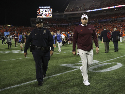 Dec 3, 2016; Orlando, FL, USA; Virginia Tech Hokies head coach Justin Fuente walks off the field after a game against the Clemson Tigers during the ACC Championship college football game at Camping World Stadium. Clemson Tigers won 42-35. Mandatory Credit: Logan Bowles-USA TODAY Sports